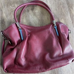 Heshe genuine leather bag. H:16” with strap, W:15”.